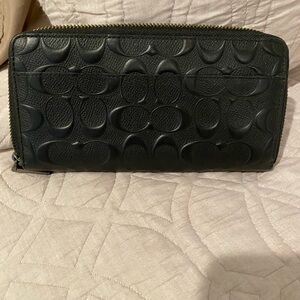 Coach long leather wallet.